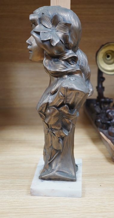 An Art Nouveau style bronzed bust of a lady on marble base, 34cm. Condition - fair